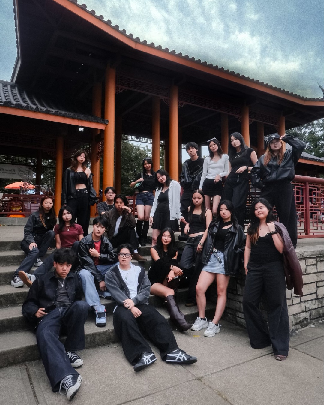 CASA Purdue members posing together on the steps outside a pavilion