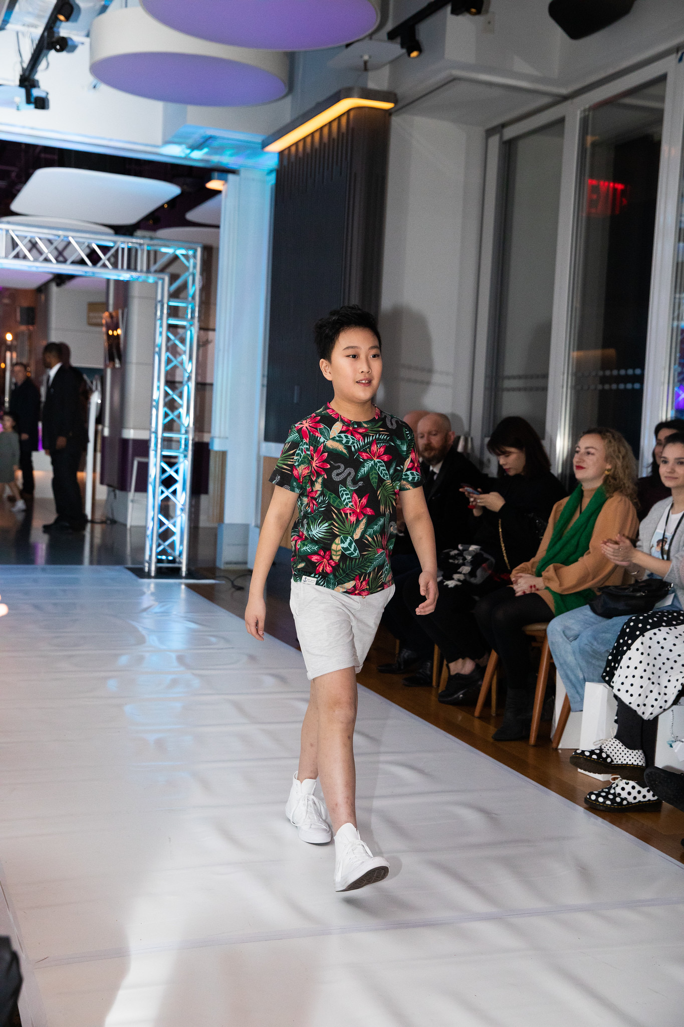 Daniel as a child walking the runway at Zao Zao Fashion Week