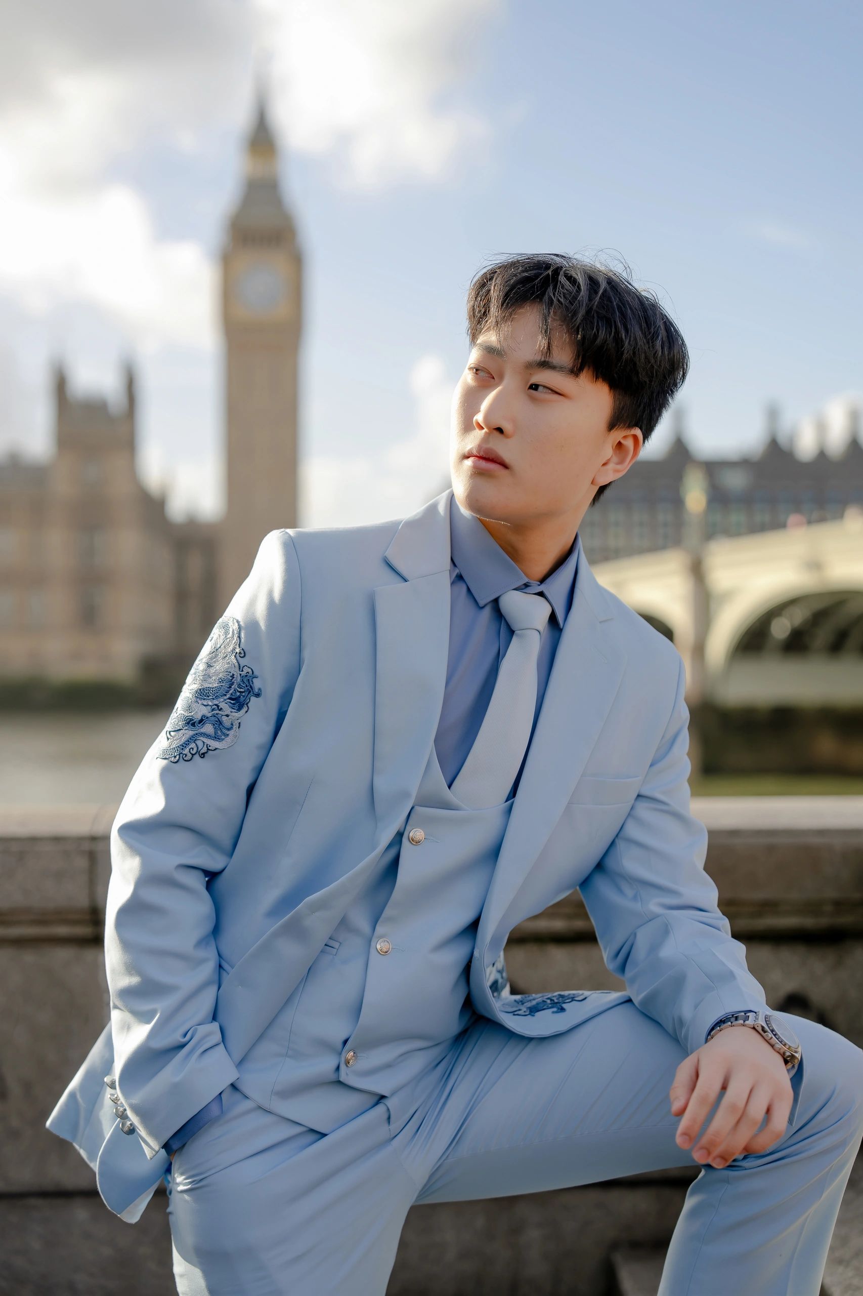 Daniel beside the Thames during London Fashion Week